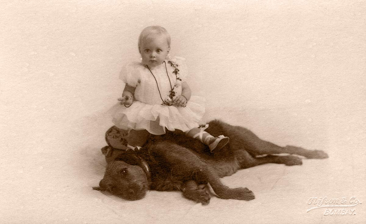 [Child and Dog]