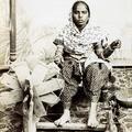 [Woman at loom]